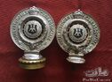 Two early Royal Automobile Club Association Auckland badges