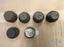 Various Model T Ford hubcaps