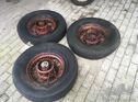 Three mid 1930s Cadillac wheels