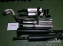 1x Front pipe & expansion box, 1x Front silencer, 1x Rear silencer, and 1x Tail pipe