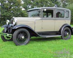 Ford Model A 4-door Sedan grey with black fenders 1930 SOLD