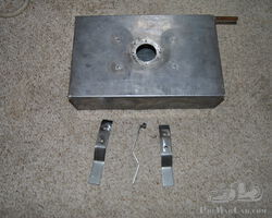 Under seat reserve oil tank