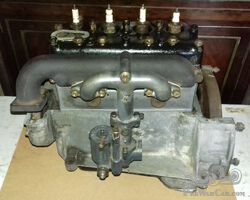 Vintage 1926 Austin 7 magneto engine with manifolds and Zenith carburettor.