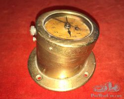 An early brass 8 day dashboard clock