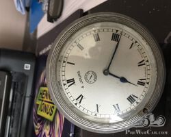 Montre Jaeger fond blanc  en  bon état