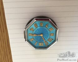 CLOCK  SWISS MADE  WITH SCREW IN BODY