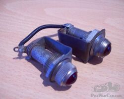 Two Dashboard warninglights. Real glass.