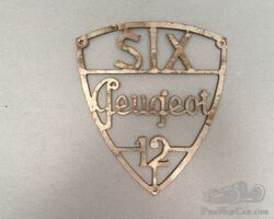Peugeot 12-six badge