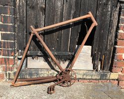 c.1900 French safety bicycle frame and chain wheel.