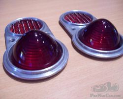 Nice beehive glass tailights in cast aluminium housing. Vintage French.