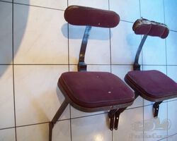 Vintage folding jumpseats for extra rear passengers.