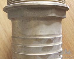 Large brass fuel tank neck.
