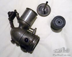 An Acetylene Lamp, Manufactured by 'MF' of St.Etienne, for a small motorcycle or Bicycle.