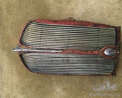 Grille with mascot and crankhandlecover for Standard Nine .1940s