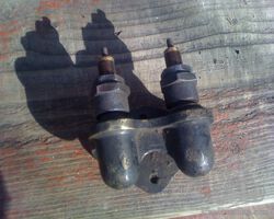 Twin cylinder spare plug holder