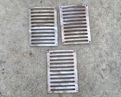 Three nickeled kickplates to mount on valances of 1920s vintage cars
