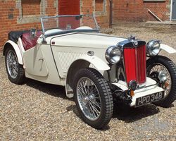 A super aluminium bodied MG TA in the style of a Cream Cracker (but without brown wings!)