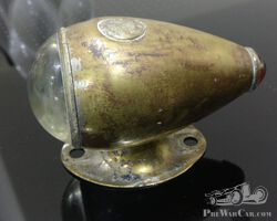 Brass bullseye side lamp by Swallow