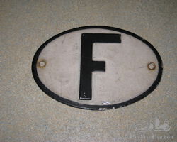 Small Oval Embossed Aluminium French F Country Plate
