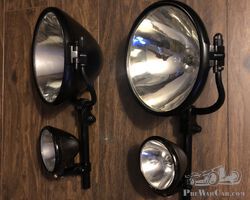 Set of Bosch headlamps and spotlamps including original irons