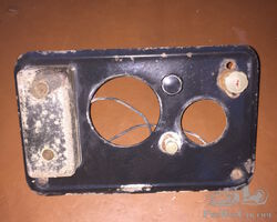 Enamelled dash panel with junction box and pull switches