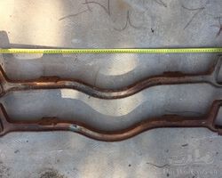 TWO EARLY FRONT AXLES