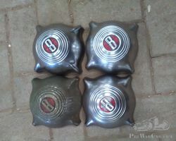 8 cylinder hub caps 4 pices in nice condition
