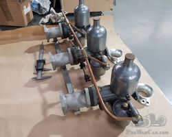 triple carburettor system for an Alvis
