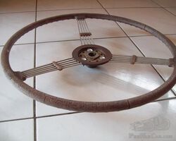 Delahaye steering wheel. RED see through plastic/resin. Banjo steering wheel.