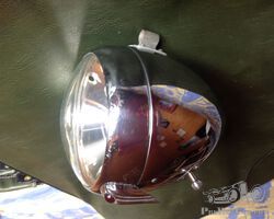 Small headlight for Motorcycle or cyclecar. Delivered to Rétromobile Paris