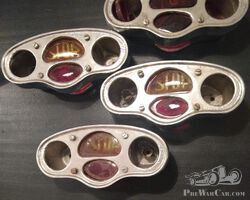 Rear lights still have to be finished. Middle glass is original. These rear lights are reproduction