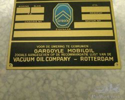 Bodywork badge N.V. Automobiles Citroen Amsterdam. Corner is slightly folded.