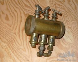Brass oiler for early engine.
