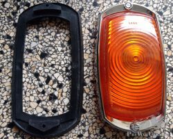 Rear light glass with rubber