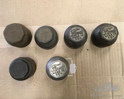 Various Model T Ford hubcaps