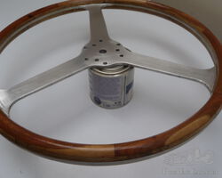 Three spoke wood wheel