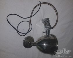 Small Spot Lamp windscreen mounted with rear view mirror.