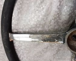 Vintage 4 spoke steering wheel.