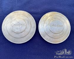 2 Peugeot hubcaps