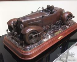 Duesenberg J-437 Speedster Bronze Sculpture "High Gear" By Stanley Wanlass