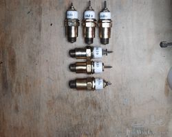 6 Oleo spark plug for engine .