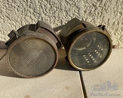 pair of brass headlights