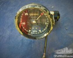 Speedometer at a 90 degree angle , new old stock, tank