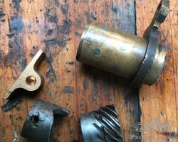 AMILCAR ENGINE PARTS. CRANK DOG SPEEDO GEAR ETC.