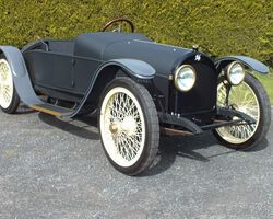 An extremely rare and important early hybrid power automobile