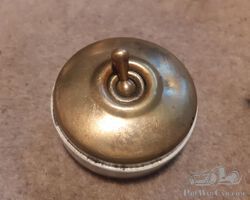 Early brass and ceramic ignition switch