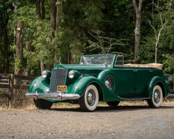1937 Packard Series 1502 Super Eight Convertible Sedan | The Audrain Concours Auction 2024 by Bonhams|Cars