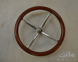 Steering wheel with shaft – car unknown