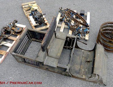 Pile of parts or mystery motorcar?