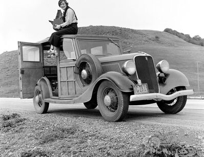 This is not some ordinary lady, sitting on a truck